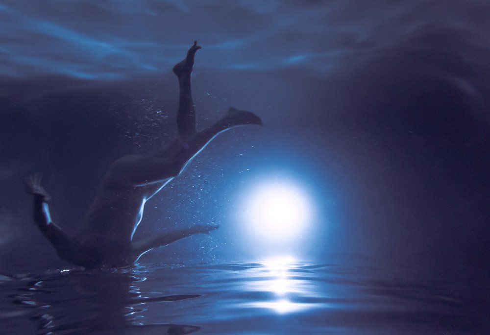 blue #2, from blues — figure descending into deep blue water.