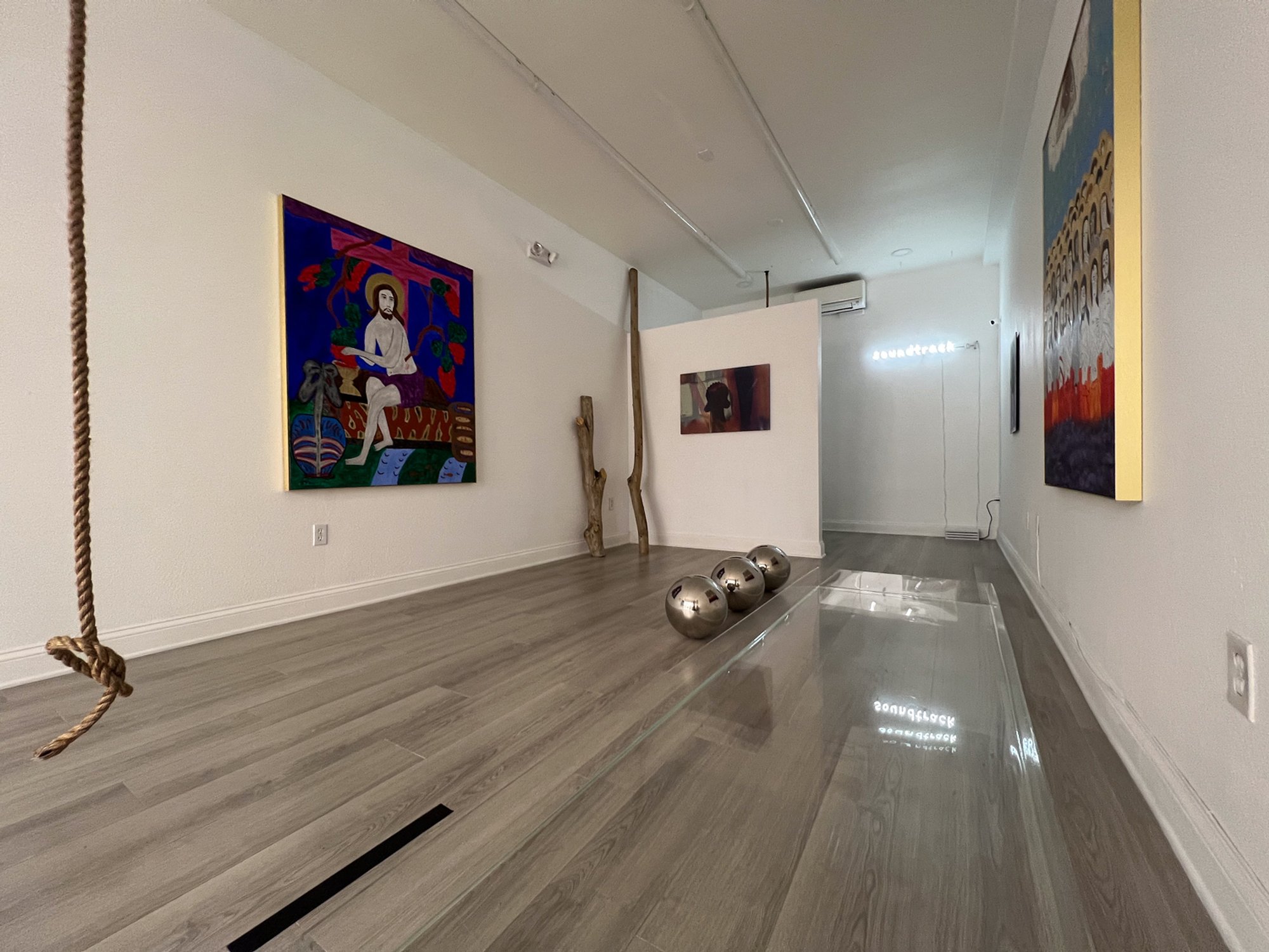 fables, installation view at writings, level of service not required (LOS/NR), La Jolla, 2025 — gallery view with fables piece on partition wall among writings paintings