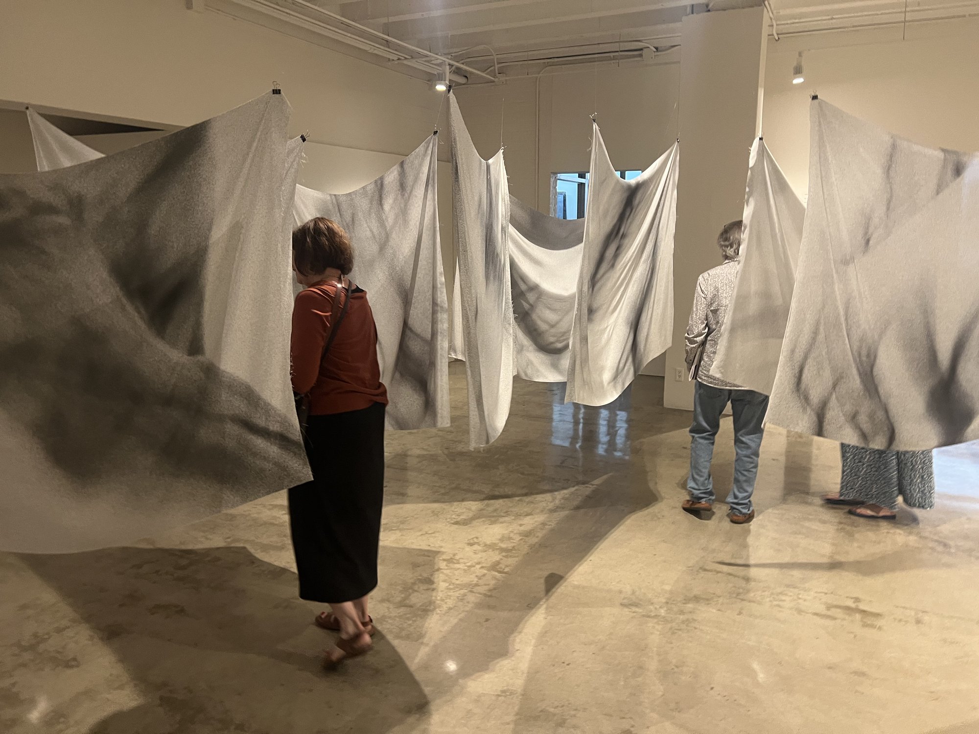 grains, installation view with viewers, Ronald H. Silverman Fine Arts Gallery, Cal State LA, 2023