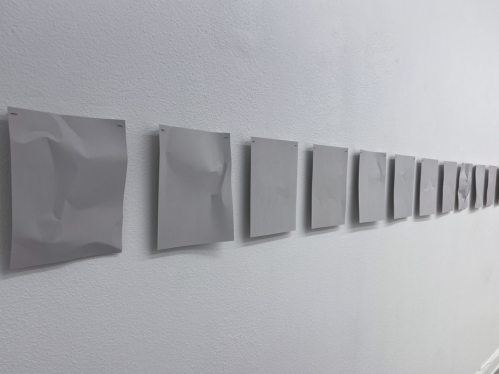hugs on wall, perspective view at LOS/NR, La Jolla, 2025