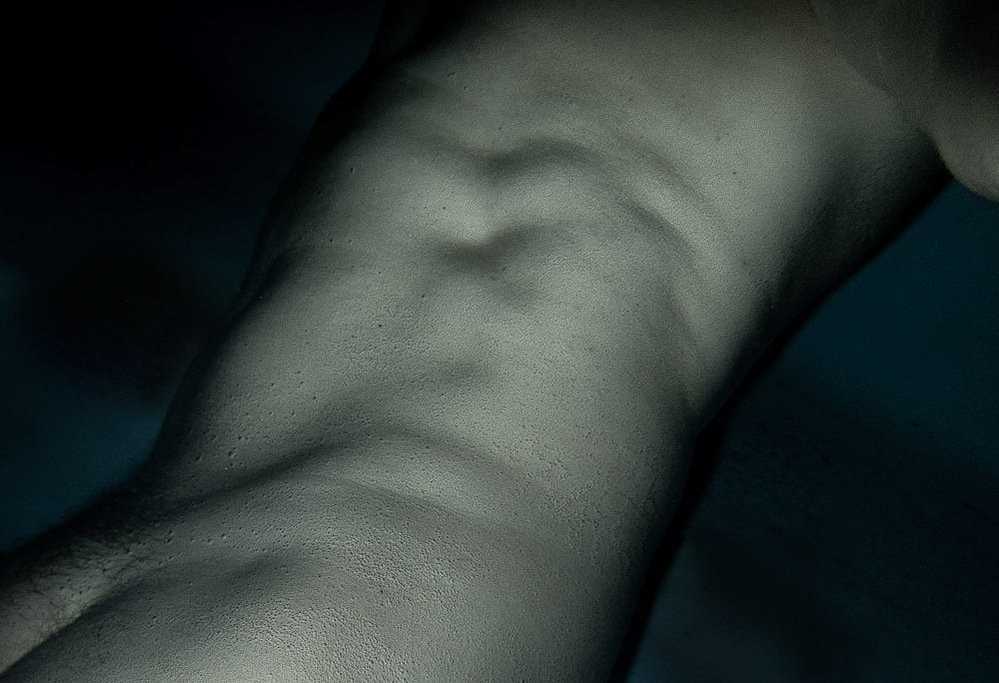 night swim #6, limb underwater with rippled light, 2020