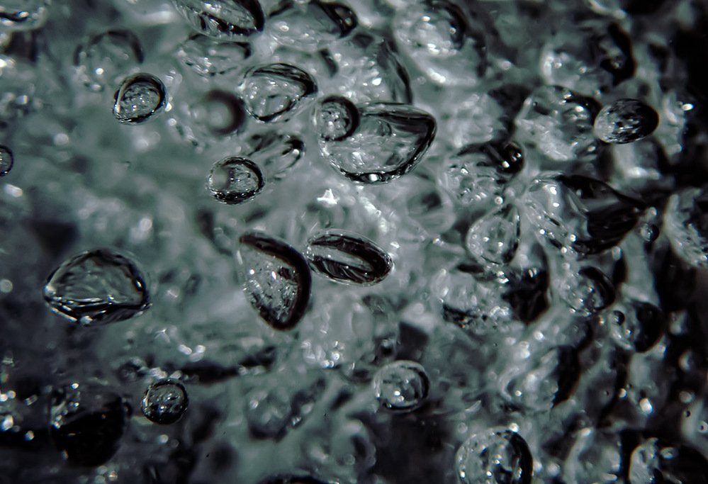 air #1, macro of water droplets and bubbles in dark grey ground, 2019
