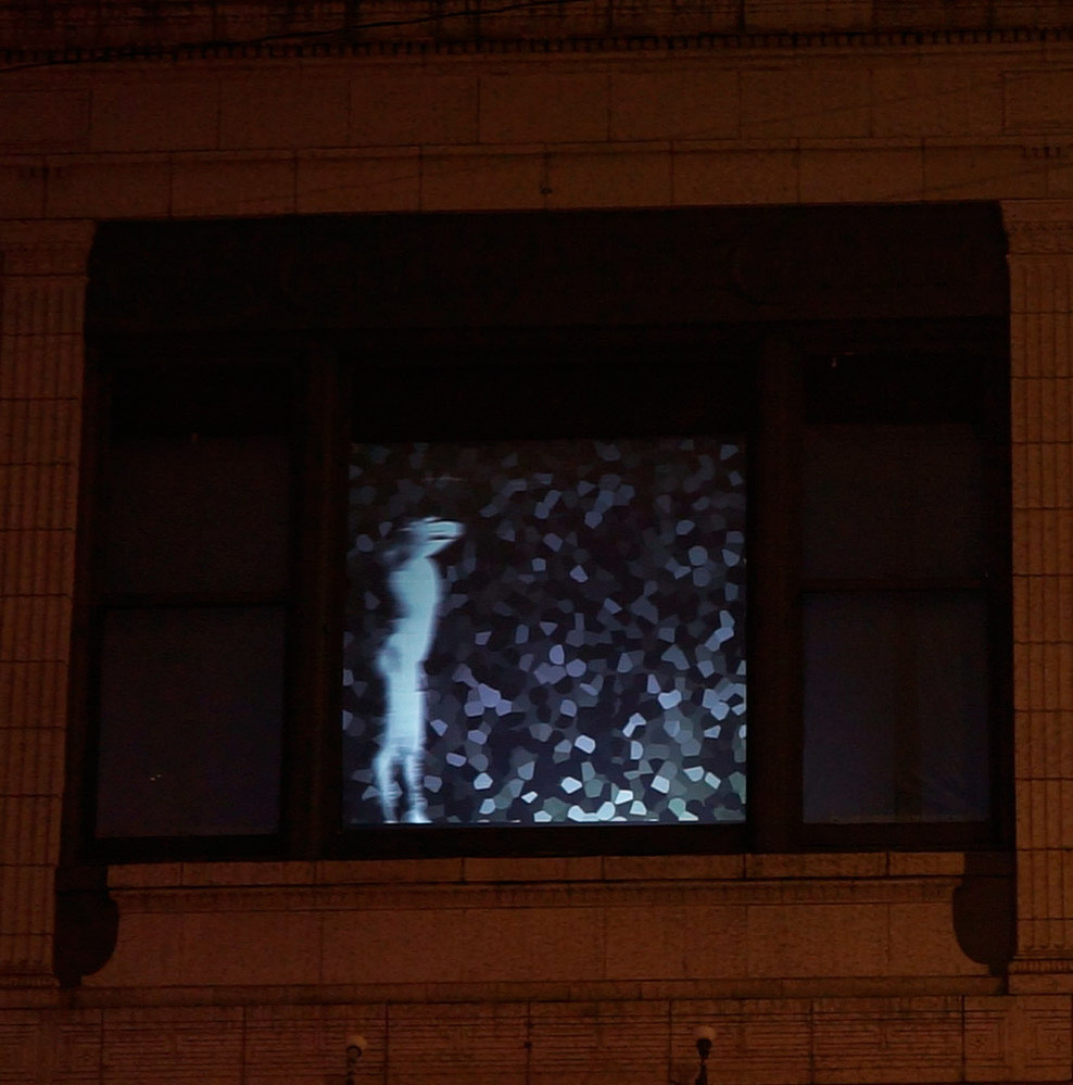 sub-limin-al, installation view, window projection at 1 West Grand, Chicago, IL, 2023