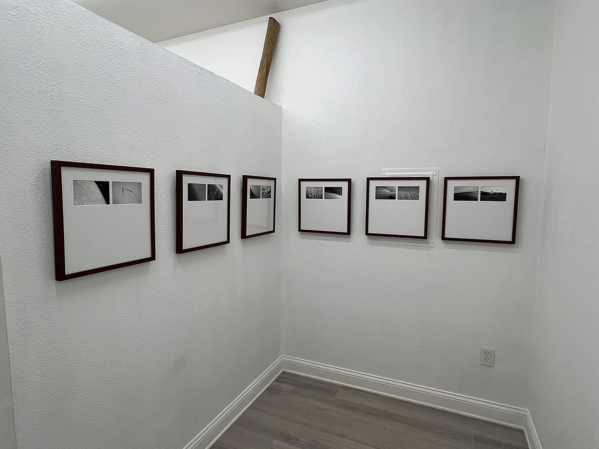 traces, installation view at writings, level of service not required (LOS/NR), La Jolla, 2025 — six framed diptychs hung on adjacent gallery walls, with a wood beam visible above