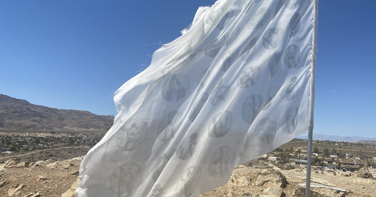 the white flag flying at Chocolate Drop, Twentynine Palms, 2021 — silk fabric printed with body figures in circles